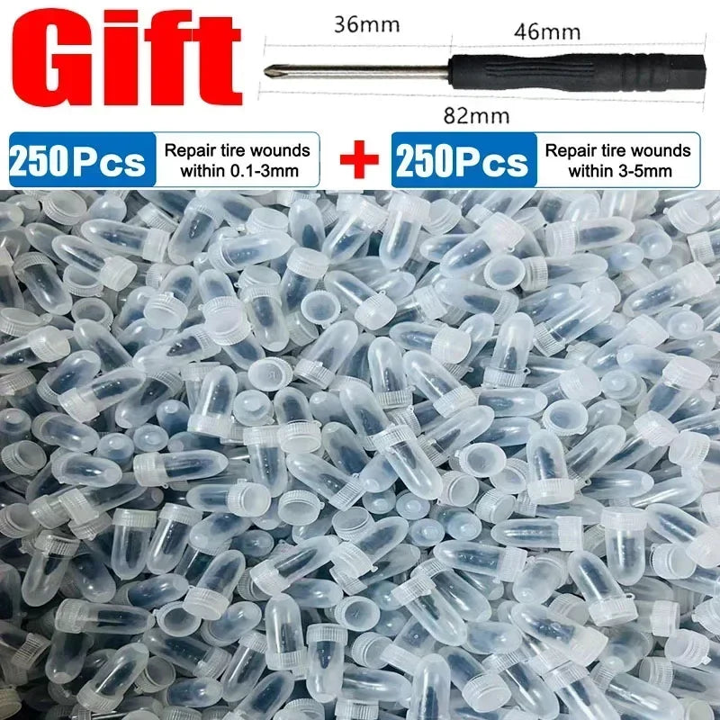 A pile of clear rubber tire repair nails and a measuring tool showing different nail lengths.
