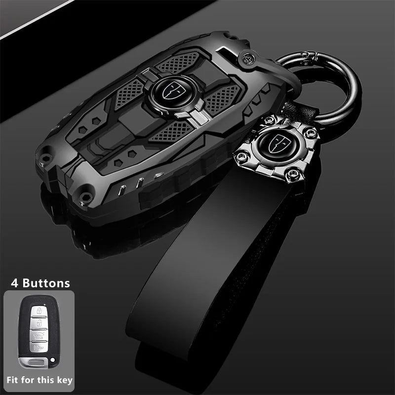A black protective key fob cover is shown with a metal ring, next to an illustration of four buttons for Hyundai and Kia mode