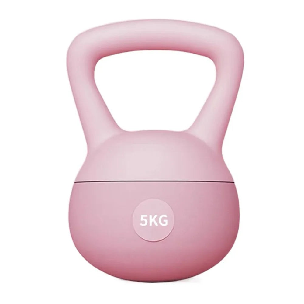 A pink soft kettlebell with a handle and a 5KG weight marking.