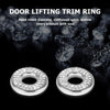 A close-up shot of four silver door lifting trim rings adorned with sparkling diamonds and rhinestones.
