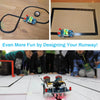 A small line-following robot built with an Arduino and various electronic components on a white surface.