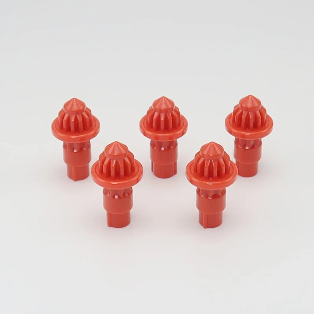 A set of five orange replacement drivers for a battling top, used in a 5-pack.