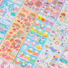 A colorful assortment of kawaii stickers featuring cute characters, food items, and various designs for journaling and crafts