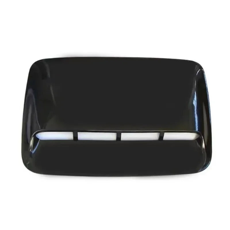 Black decorative air intake vent or hood scoop cover with illuminated white lines.