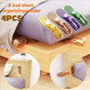 Four silicone bed sheet organizing wonders used to lift and manage bed sheets on a mattress.