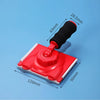 A red paint edge trimmer with a black rotatable handle shown against a blue background.