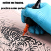 A hand in a blue glove is using an orange tattoo pen to outline a tiger design on skin and thermal transfer paper.