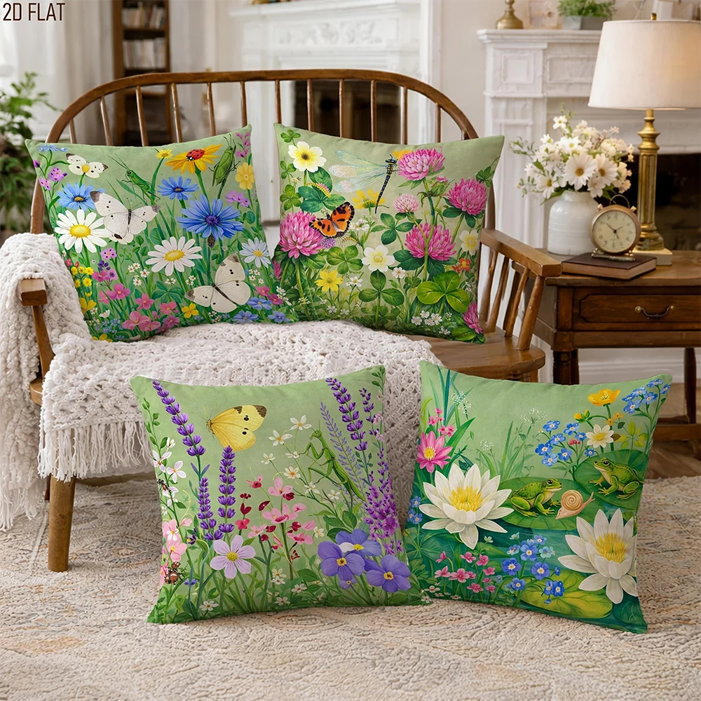 A collection of colorful floral and butterfly patterned throw pillows displayed on a light rug in a farmhouse setting.