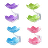 A set of three purple, green, and blue lotus-shaped bathroom storage racks with drainage features.