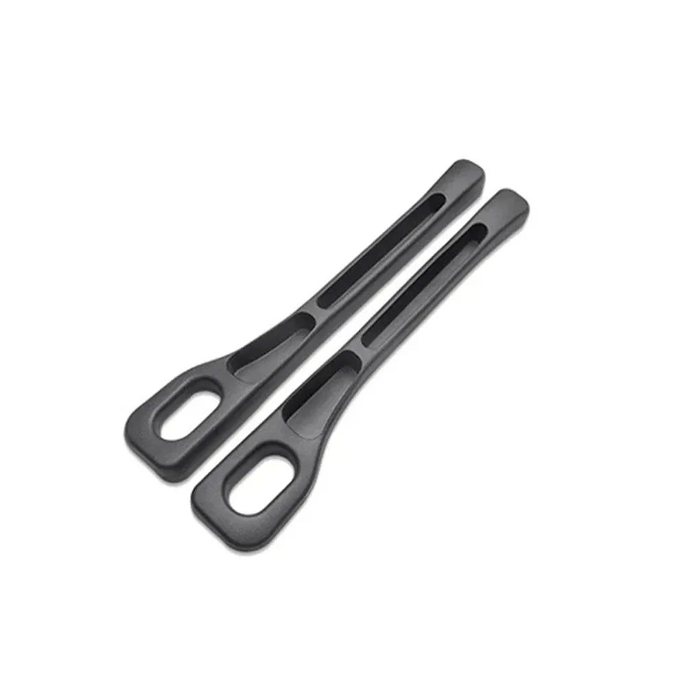 A pair of black car seat gap filler organizers for waterproof crevice storage.