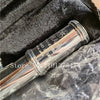 Silver-plated 16-hole flute in C key with E mechanism inside a black padded case.