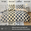 A checkered print bedding set featuring a duvet cover and pillowcases shown under dim, warm, cold, and natural light.