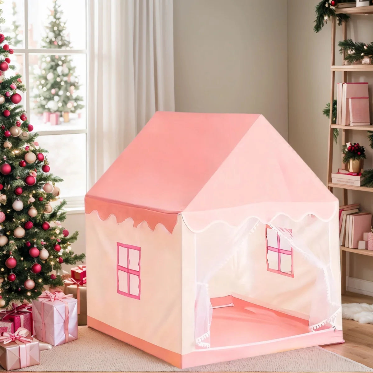 A pink play tent shaped like a castle with decorative trim and windows, set in a bright room.