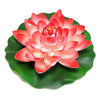 A vibrant pink lotus flower with green leaves floating on water.