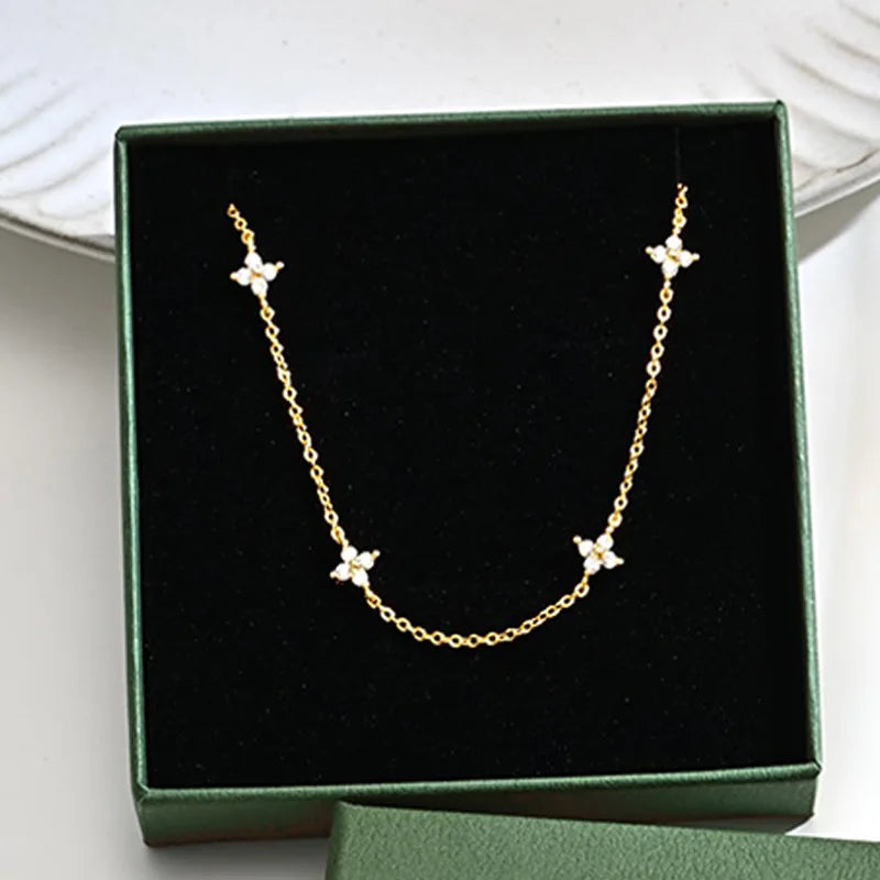 Dainty Lucky Leaf Necklace with White CZ Flowers