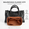 Black Balenciaga Classic City organizer insert featuring a brown felt bag with a zippered pocket.