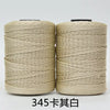 Two spools of beige 3-ply polyester knitting yarn for crochet and hand crafts