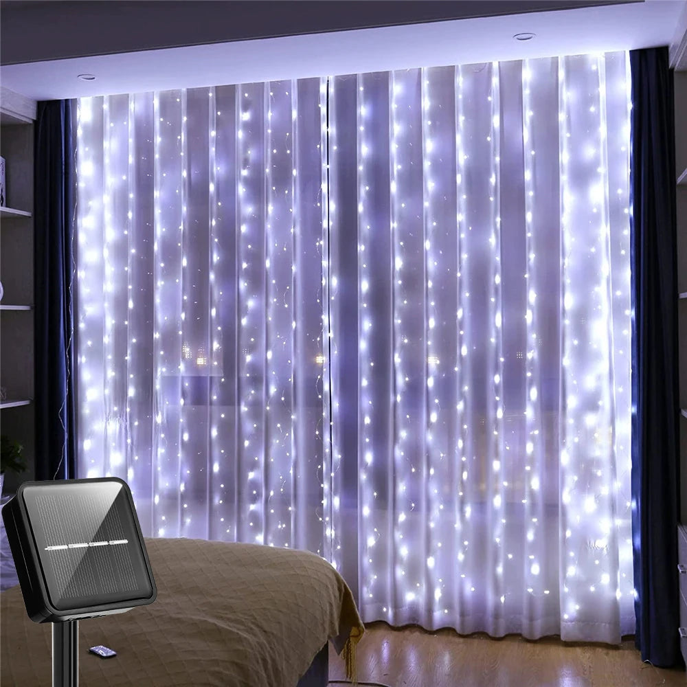 A sheer curtain illuminated by vertical strings of twinkling purple LED lights.
