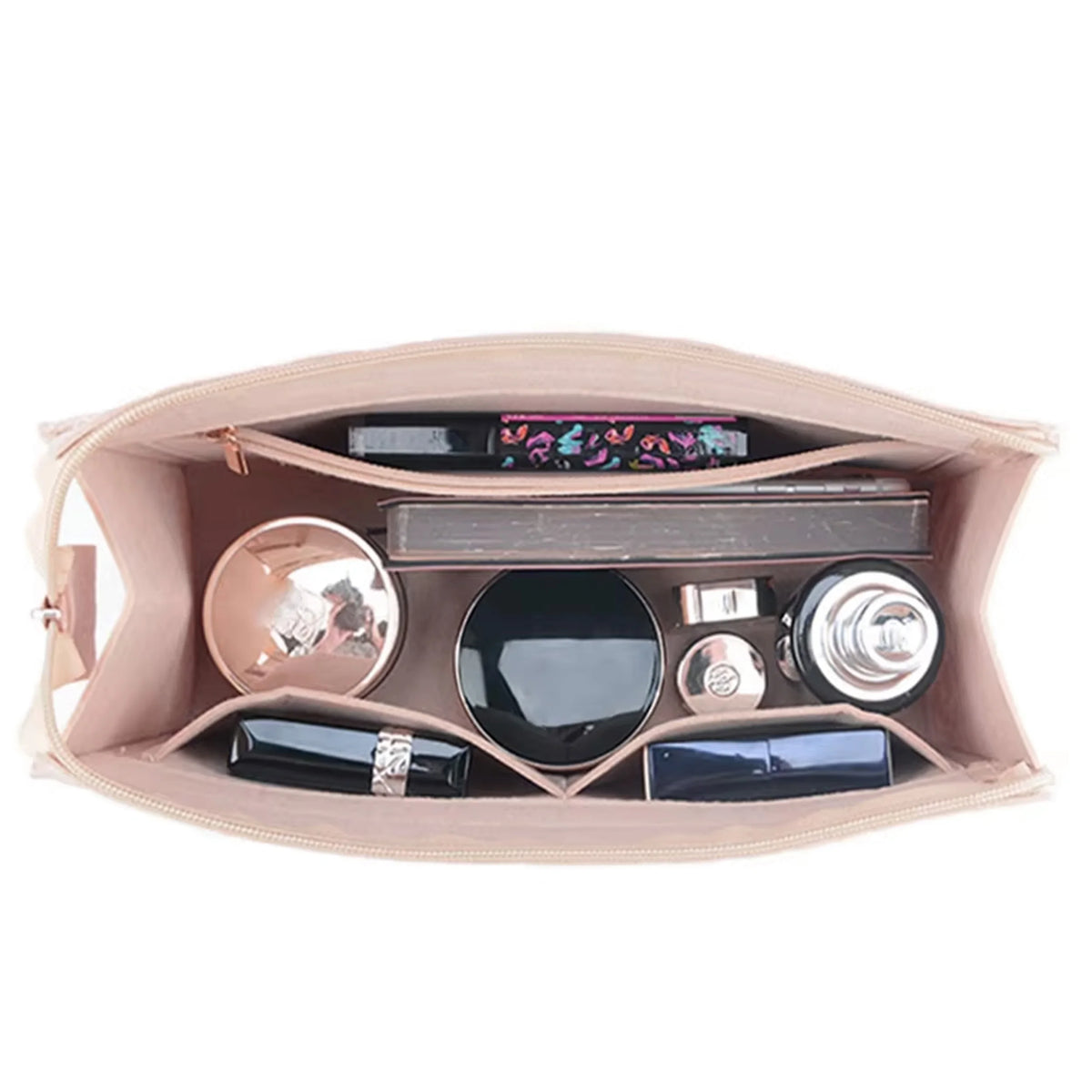 A light pink felt multi-pocket purse organizer insert showing various small accessories and compartments.