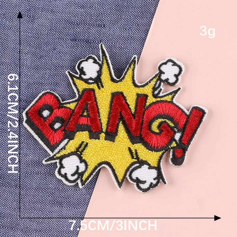 Yellow and red embroidered lettering patch shaped like an explosion with a bang text