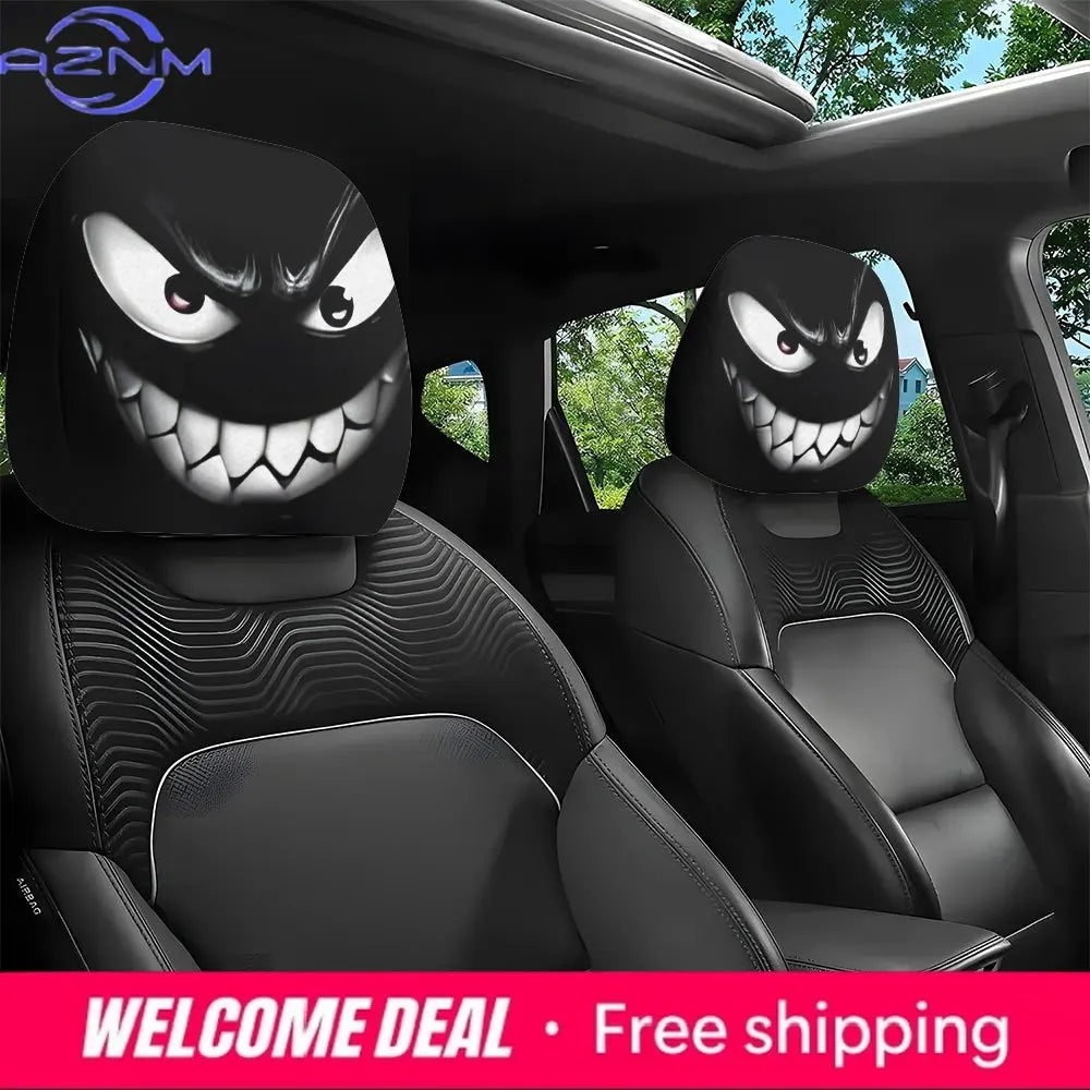 A pair of black car headrest covers featuring an evil grin design for car seats.