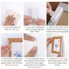 Step-by-step instructions showing how to attach a picture frame to a wall using removable adhesive strips.