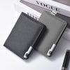A dark gray slim vertical leather wallet with multiple card slots resting on a white surface.