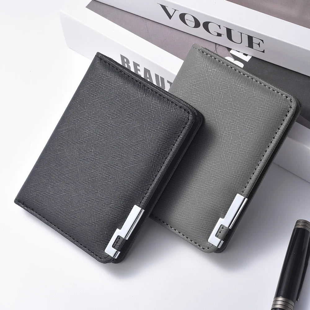 A dark gray slim vertical leather wallet with multiple card slots resting on a white surface.