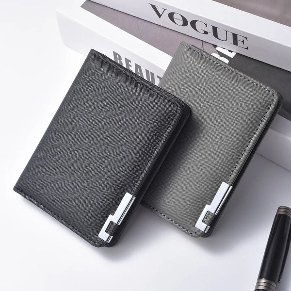 A dark gray slim vertical leather wallet with multiple card slots resting on a white surface.