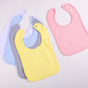 A set of six cotton bandana bibs in various pastel colors including pink yellow blue and gray for babies