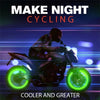 A motorcycle is shown with bright green glowing wheels and tires in a dark, futuristic setting.