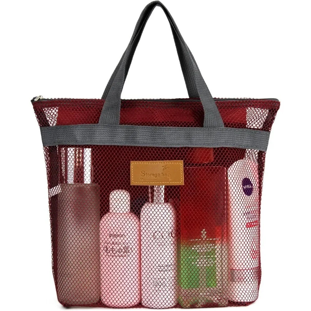A mesh hanging toiletry bag in red and gray with various toiletries inside.