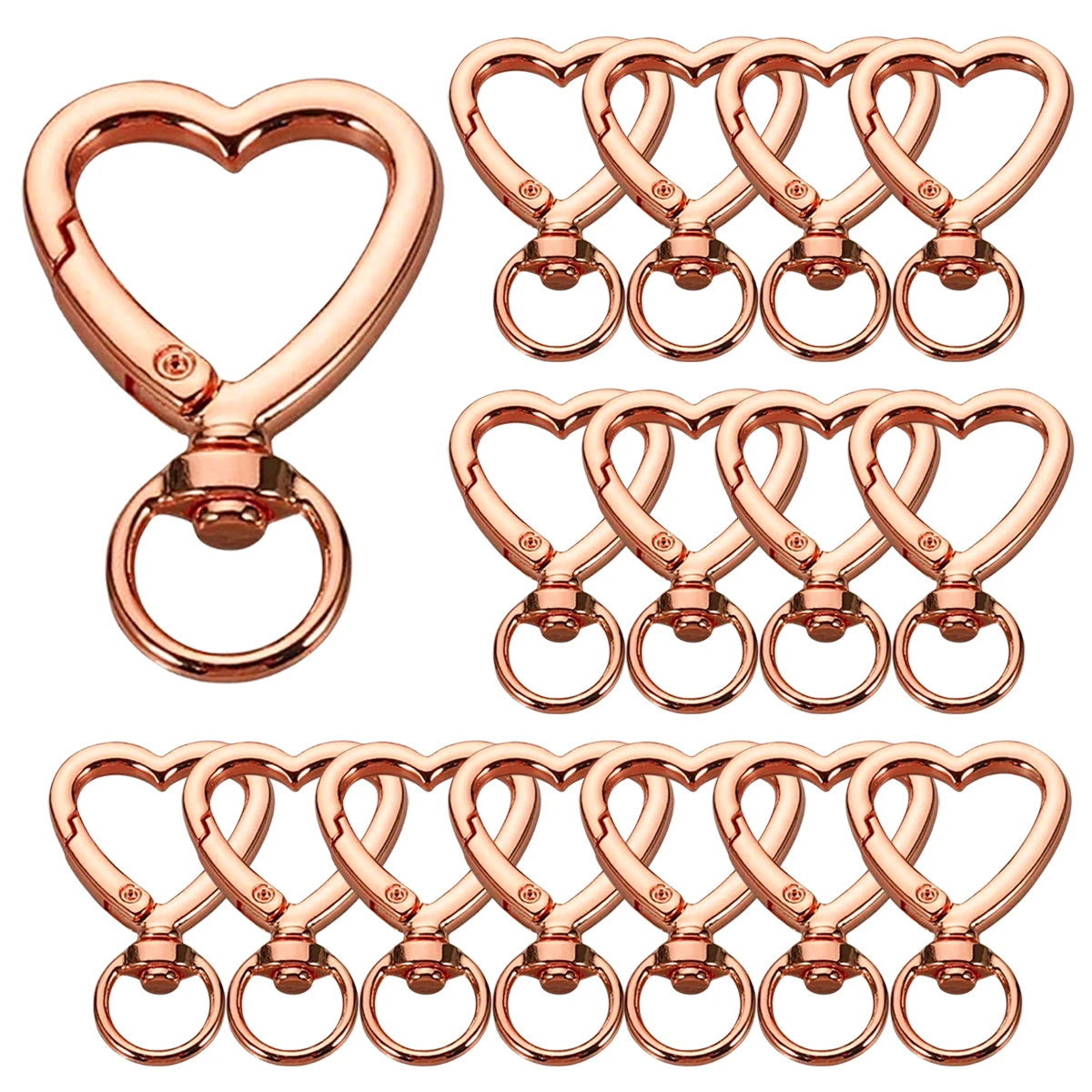 A set of rose gold heart-shaped spring hook keychains for keys, bags, and luggage.