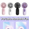 Four versions of a portable handheld fan in pink, silver, black, and purple colors shown with rotating blades.