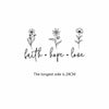 A black line drawing featuring the words faith hope love with small floral elements.