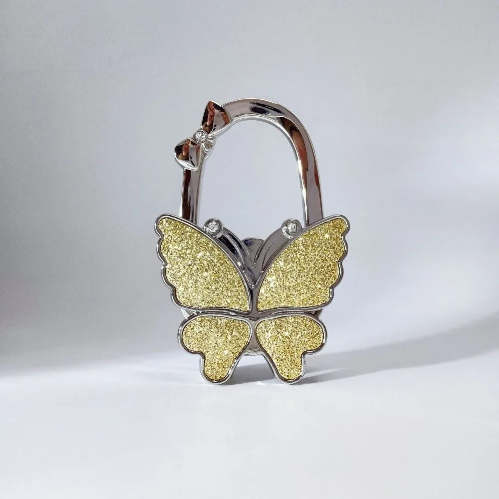 Silver foldable butterfly shaped handbag hook with glitter finish