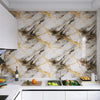 Marble pattern peel and stick self-adhesive wallpaper featuring gray and gold veining on a kitchen backsplash.