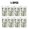 Eight clear acrylic piggy banks filled with US currency bills and coins.