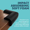 Black soft foam corner guards transforming sharp edges on wooden furniture for safety.