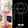 Clear plastic balloon column stands with pink and gold balloons for party decor