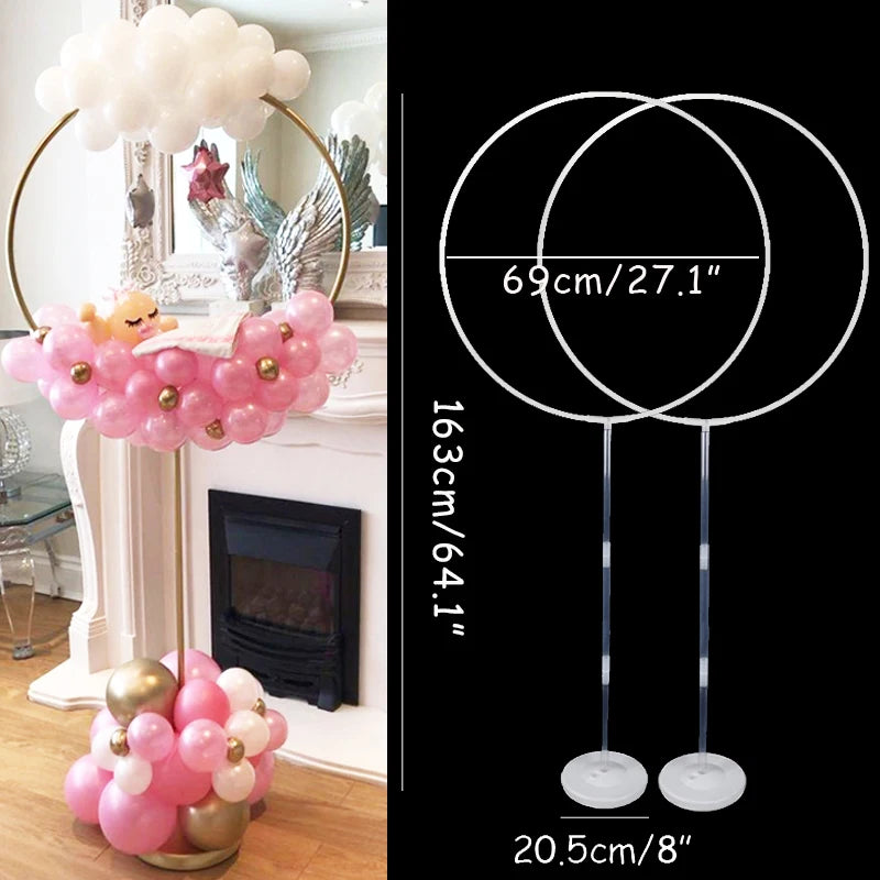Clear plastic balloon column stands with pink and gold balloons for party decor