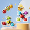 A collection of colorful, ocean-themed spinning bath toys featuring bees and other sea creatures on a light blue background.