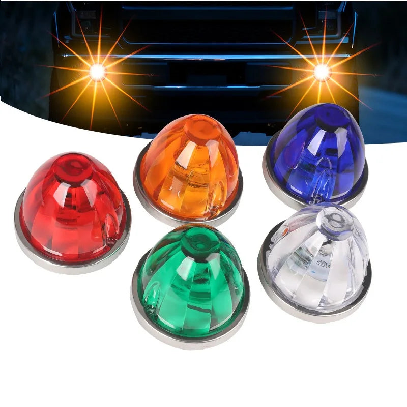 Set aus vier robusten LED-Warnmarkierungsleuchten in rot, orange, blau und klarem Kunststoff.