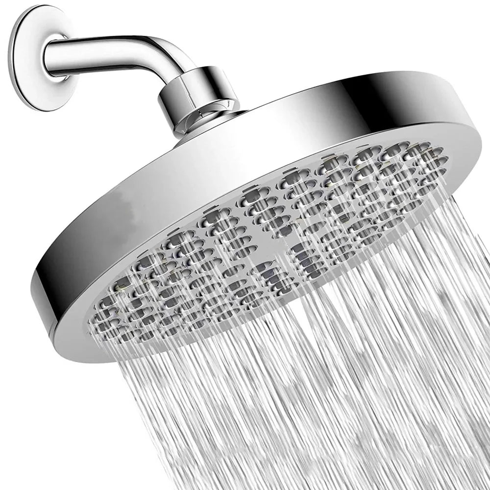 A chrome rainfall shower head with multiple nozzles is shown spraying water.