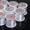 Rolls of white nylon beading cord with decorative patterns for jewelry making