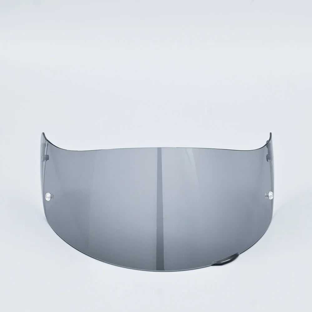 A clear motorcycle helmet visor lens shield is shown against a white background.