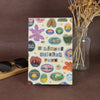 A colorful sticker book featuring various fruit, nature, and themed illustrations for scrapbooking.