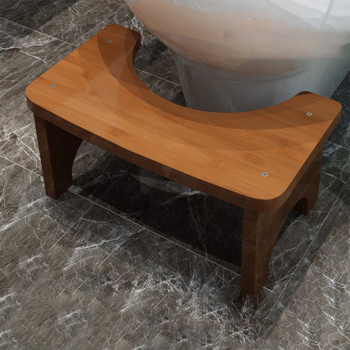 A wooden bamboo toilet squat stool with a curved seat and four legs resting on a marbled floor.