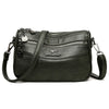 A black leather compact square crossbody bag with double-deck storage and silver hardware.