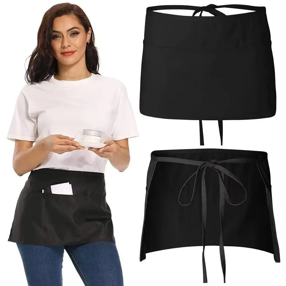 A woman models a classic black waist apron with three pockets.